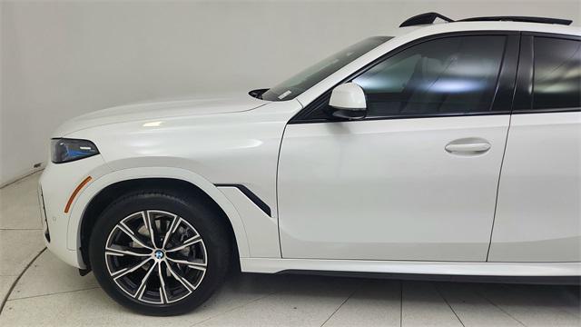 used 2025 BMW X6 car, priced at $68,950