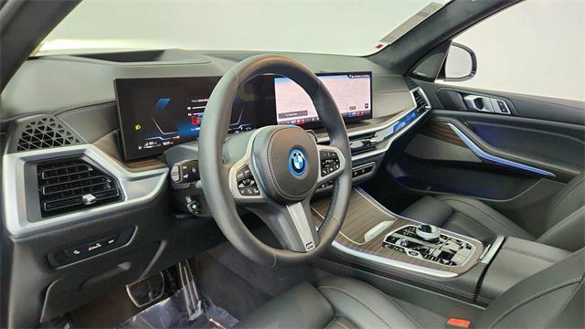 used 2025 BMW X5 PHEV car, priced at $66,850
