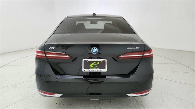 used 2024 BMW i5 car, priced at $52,950