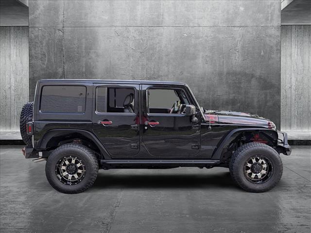 used 2016 Jeep Wrangler Unlimited car, priced at $21,995