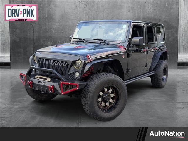 used 2016 Jeep Wrangler Unlimited car, priced at $22,238