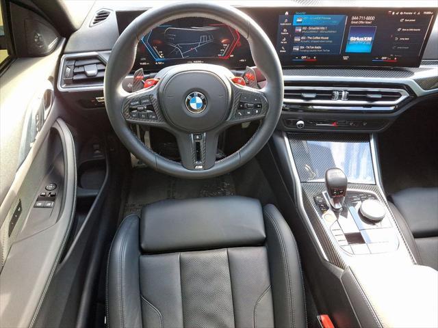 used 2024 BMW M4 car, priced at $79,500