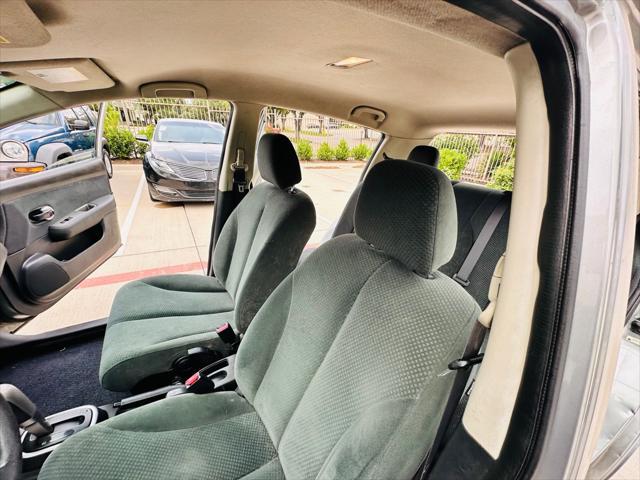used 2012 Nissan Versa car, priced at $4,990