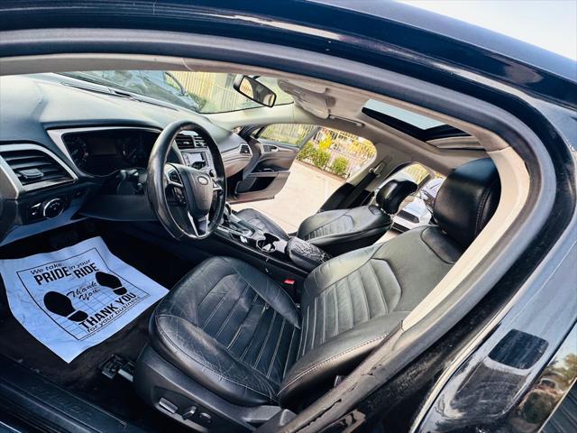 used 2015 Ford Fusion car, priced at $4,990