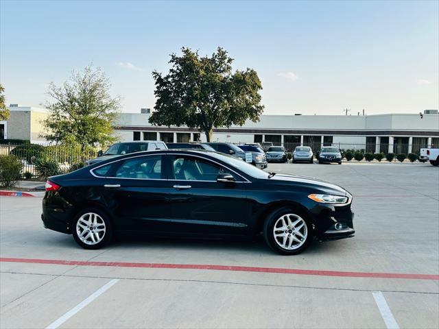 used 2015 Ford Fusion car, priced at $4,990