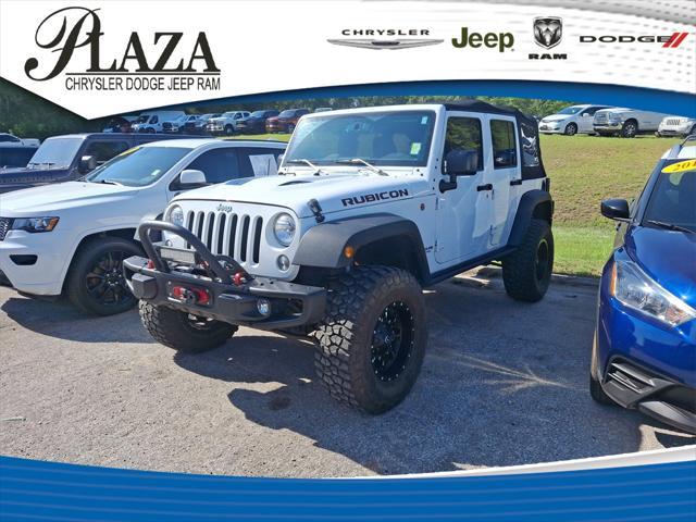 used 2016 Jeep Wrangler Unlimited car, priced at $27,991