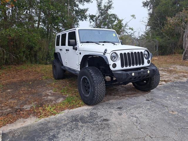 used 2016 Jeep Wrangler Unlimited car, priced at $22,991