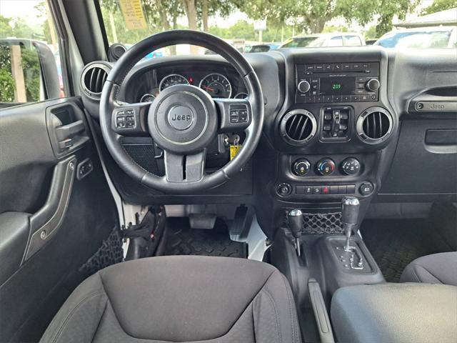 used 2013 Jeep Wrangler Unlimited car, priced at $16,991