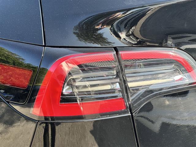 used 2023 Tesla Model Y car, priced at $28,991