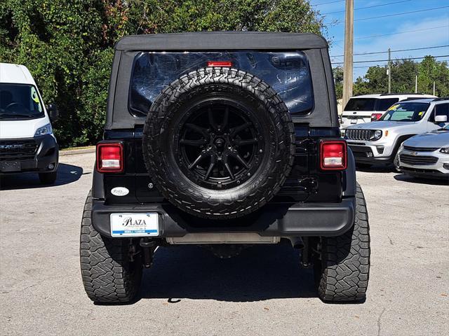 used 2023 Jeep Wrangler car, priced at $33,991