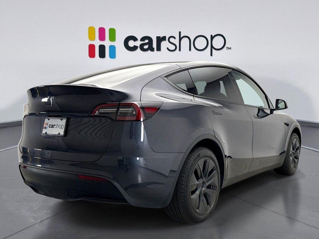 used 2025 Tesla Model Y car, priced at $37,199