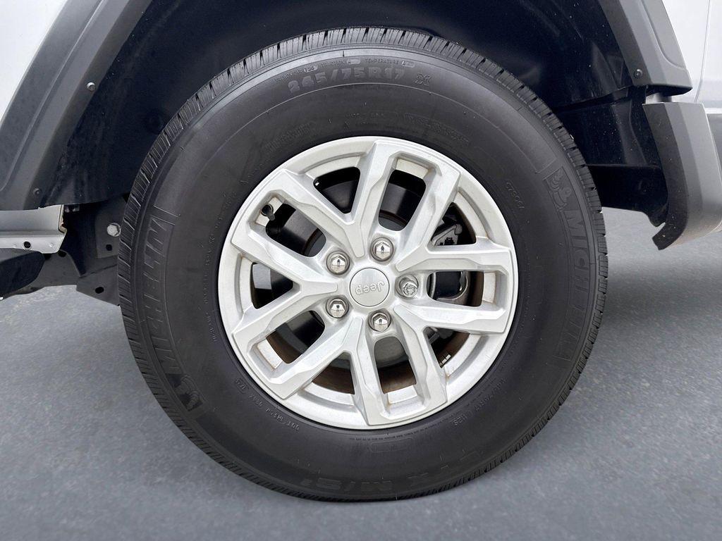 used 2023 Jeep Wrangler car, priced at $33,299