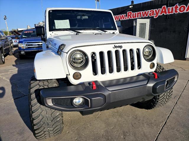 used 2012 Jeep Wrangler Unlimited car, priced at $16,777