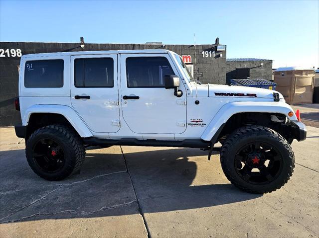 used 2012 Jeep Wrangler Unlimited car, priced at $16,777