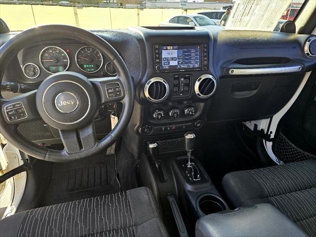 used 2012 Jeep Wrangler Unlimited car, priced at $16,777