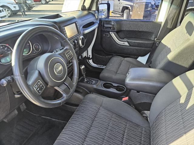 used 2012 Jeep Wrangler Unlimited car, priced at $16,777