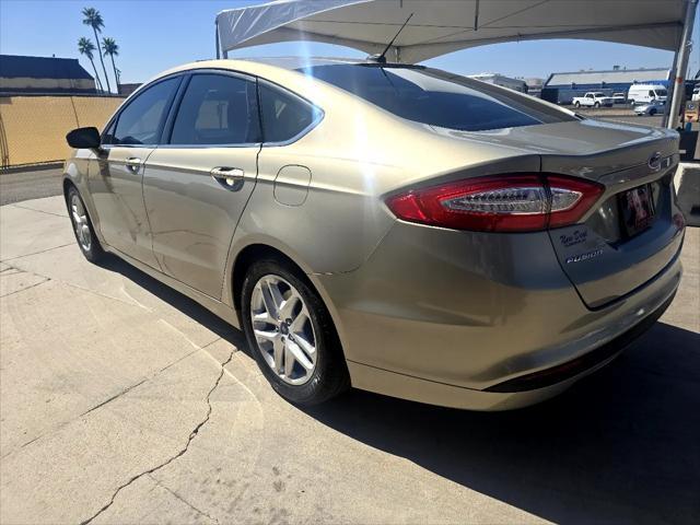 used 2015 Ford Fusion car, priced at $9,988