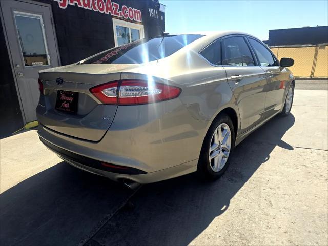 used 2015 Ford Fusion car, priced at $9,988
