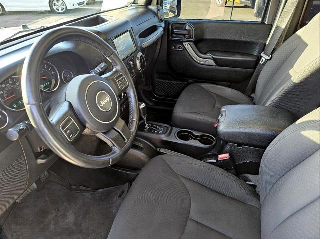 used 2018 Jeep Wrangler JK Unlimited car, priced at $21,277