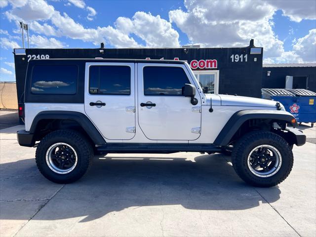 used 2012 Jeep Wrangler Unlimited car, priced at $17,277