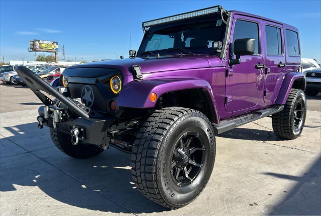 used 2012 Jeep Wrangler Unlimited car, priced at $16,988