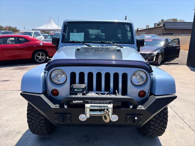 used 2012 Jeep Wrangler Unlimited car, priced at $18,777