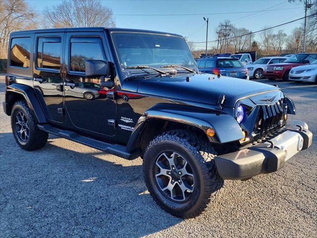 used 2011 Jeep Wrangler Unlimited car, priced at $18,495