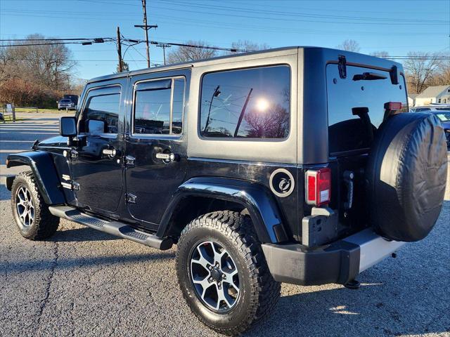 used 2011 Jeep Wrangler Unlimited car, priced at $18,495