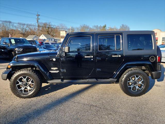 used 2011 Jeep Wrangler Unlimited car, priced at $18,495