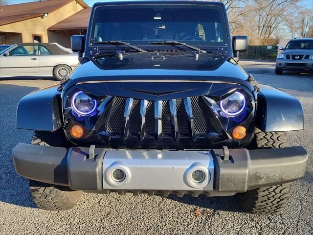 used 2011 Jeep Wrangler Unlimited car, priced at $19,995