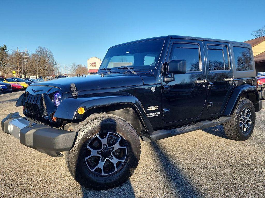 used 2011 Jeep Wrangler Unlimited car, priced at $15,995