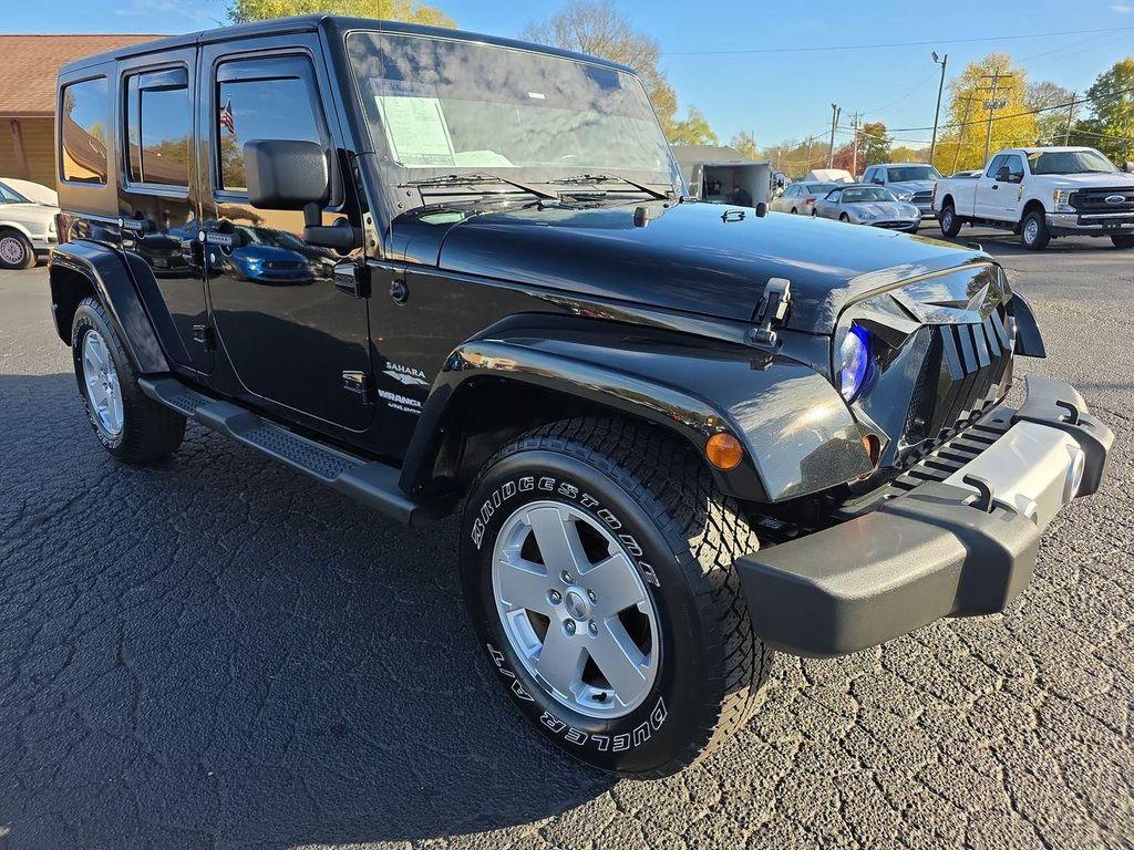 used 2011 Jeep Wrangler Unlimited car, priced at $15,995