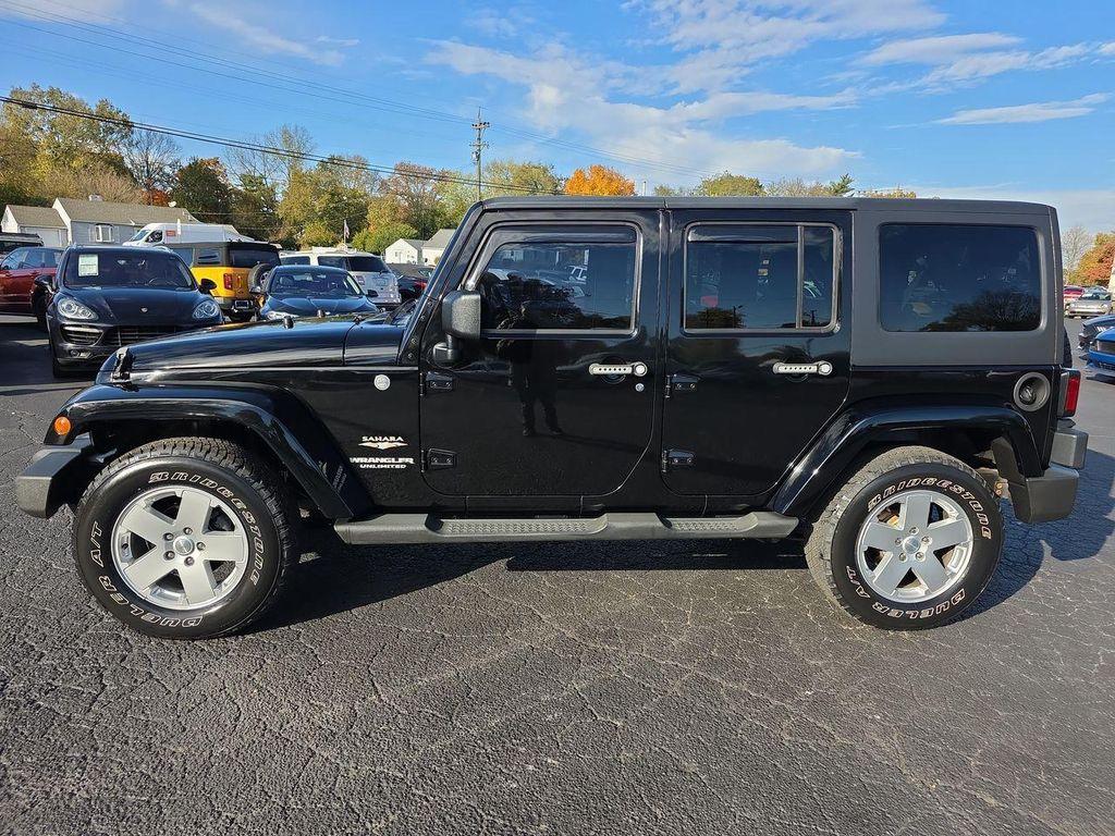 used 2011 Jeep Wrangler Unlimited car, priced at $15,995
