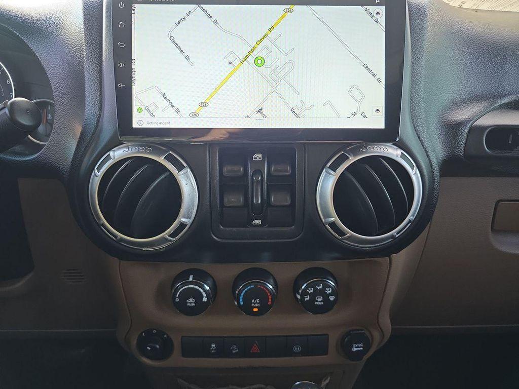 used 2011 Jeep Wrangler Unlimited car, priced at $15,995