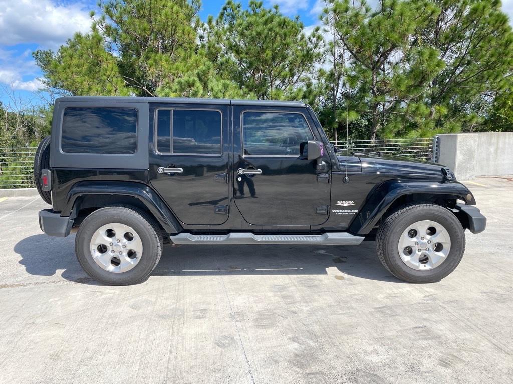 used 2014 Jeep Wrangler Unlimited car, priced at $17,007