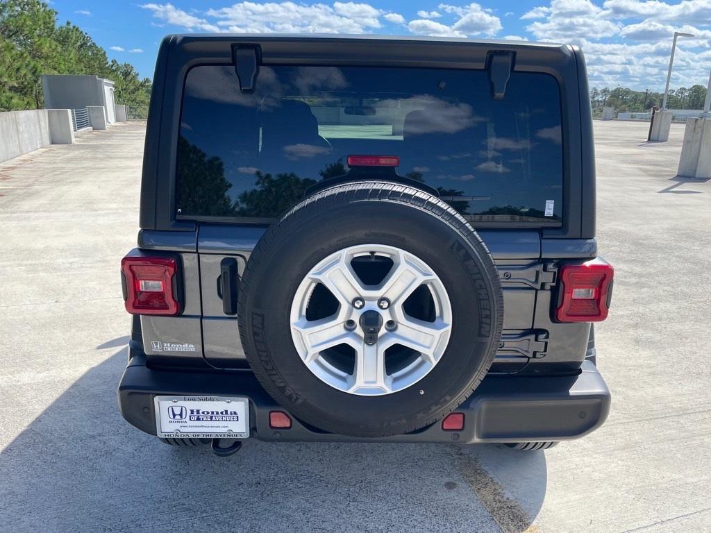 used 2021 Jeep Wrangler Unlimited car, priced at $27,541