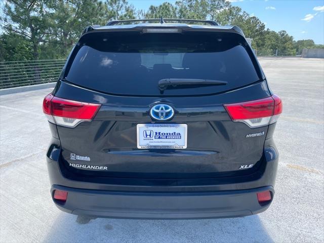 used 2019 Toyota Highlander Hybrid car, priced at $25,040