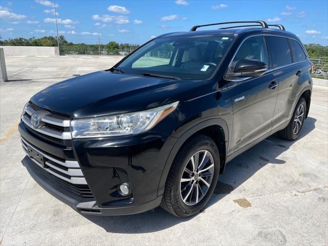 used 2019 Toyota Highlander Hybrid car, priced at $25,040