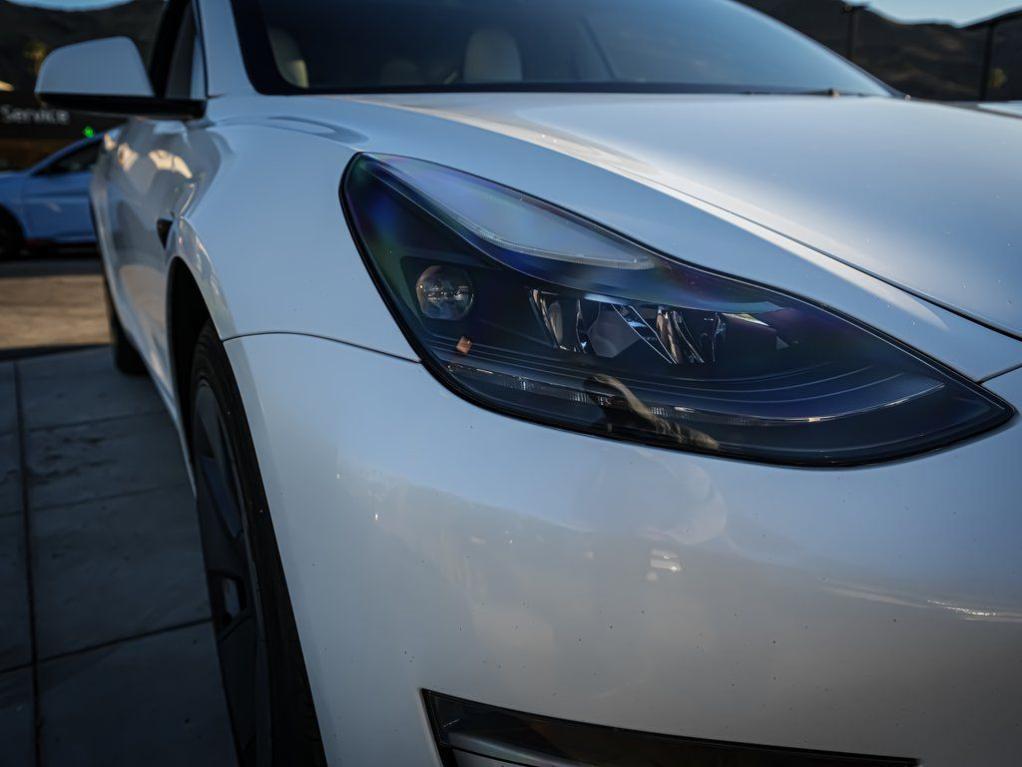 used 2023 Tesla Model 3 car, priced at $21,500
