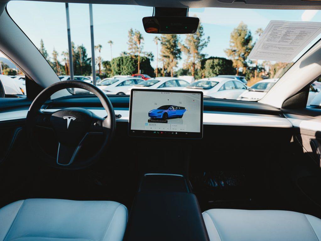 used 2023 Tesla Model 3 car, priced at $21,500