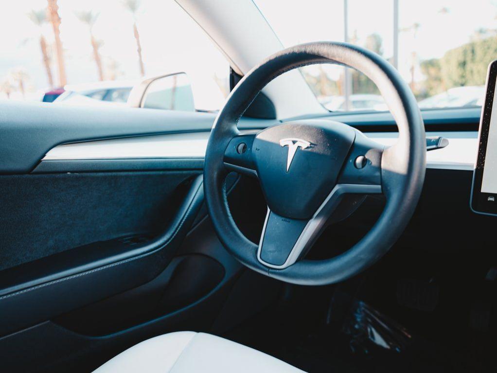 used 2023 Tesla Model 3 car, priced at $21,500