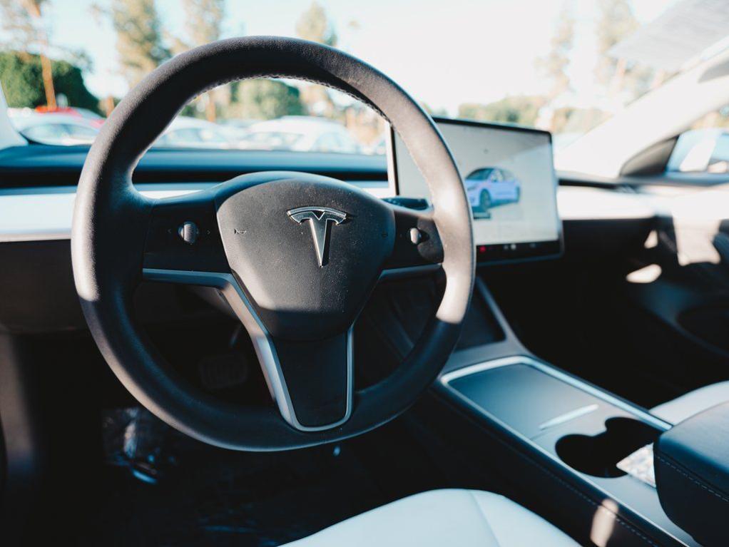 used 2023 Tesla Model 3 car, priced at $21,500