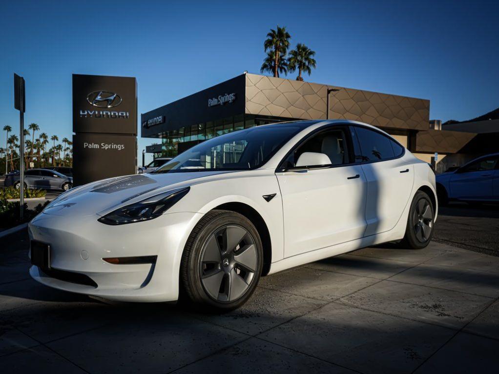 used 2023 Tesla Model 3 car, priced at $21,500