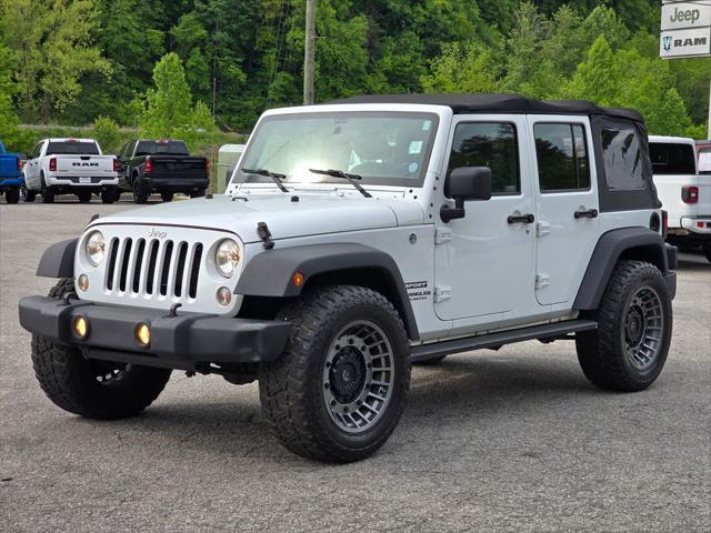 used 2017 Jeep Wrangler Unlimited car, priced at $22,573