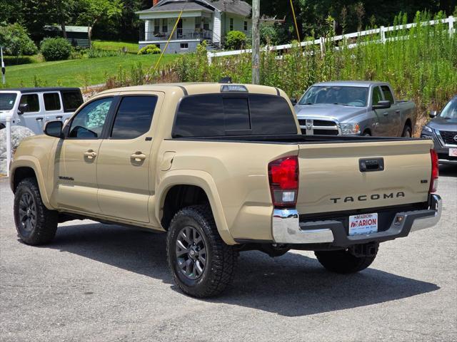used 2020 Toyota Tacoma car, priced at $28,973
