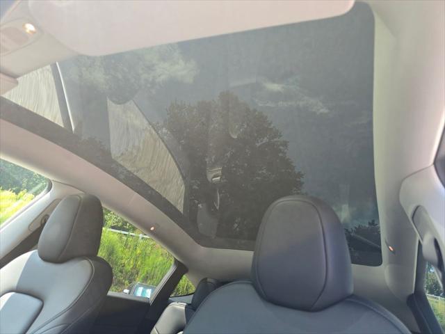 used 2024 Tesla Model Y car, priced at $34,000