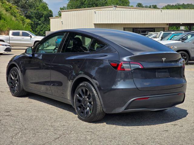 used 2024 Tesla Model Y car, priced at $34,000
