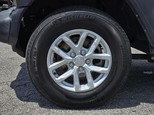 used 2023 Jeep Wrangler car, priced at $30,500