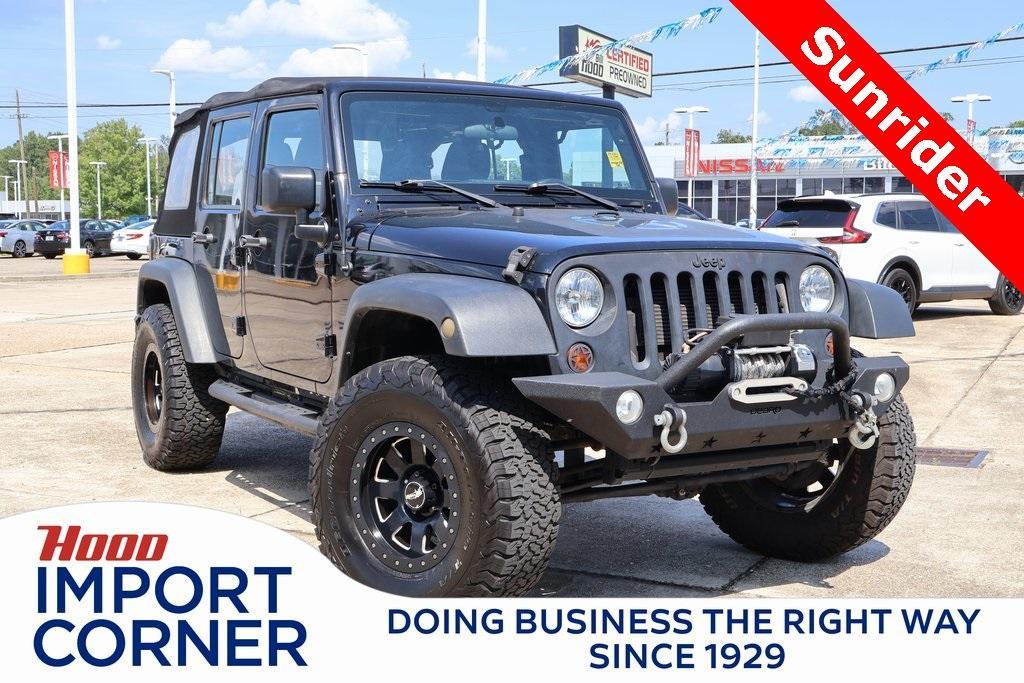 used 2015 Jeep Wrangler Unlimited car, priced at $18,484