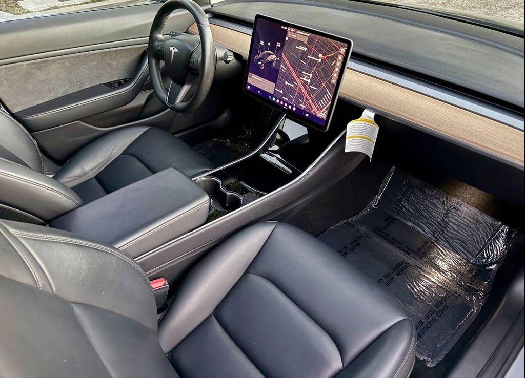 used 2018 Tesla Model 3 car, priced at $14,995